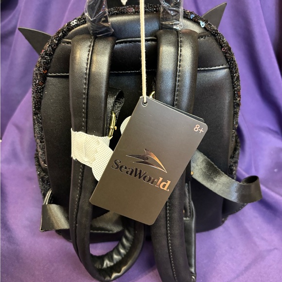 Loungefly Black and Orange Penguin Backpack Sparkly Design - Picture 3 of 4